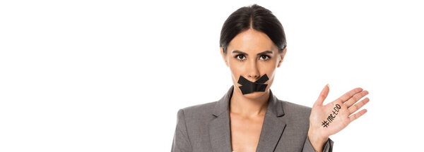 panoramic crop of businesswoman with me too lettering on hand and duct tape on mouth isolated on white