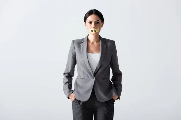 Businesswoman Sexism Lettering Scotch Tape Standing Hands Pockets Isolated White — Stock Photo, Image