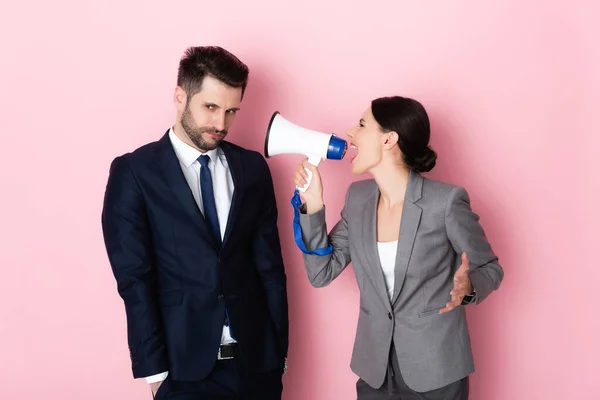 Emotional Woman Screaming Megaphone Offended Businessman Pink — Stock Photo, Image