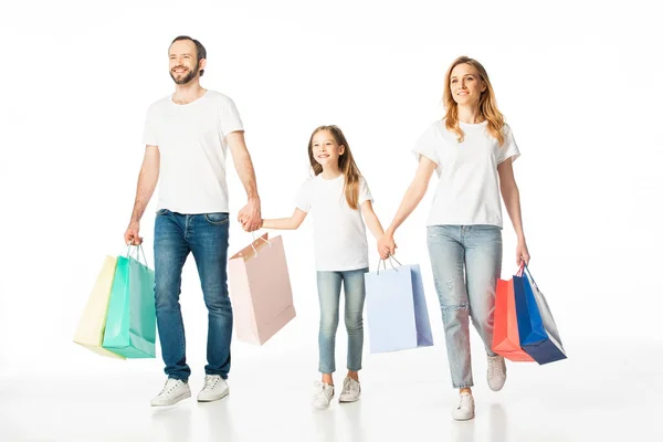 Família Alegre Andando Com Sacos Compras Coloridos Segurando Mãos Isoladas — Fotografia de Stock