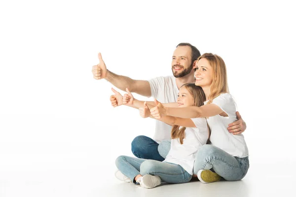 Família Feliz Sentado Chão Com Pernas Cruzadas Mostrando Polegares Isolados — Fotografia de Stock