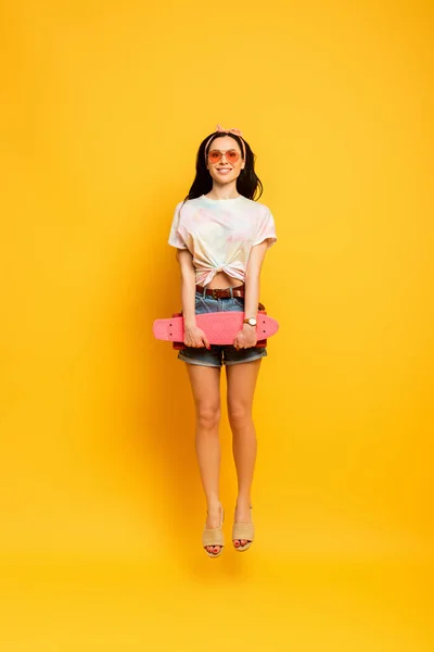 Happy Stylish Summer Brunette Girl Jumping Pink Penny Board Yellow — Stock Photo, Image