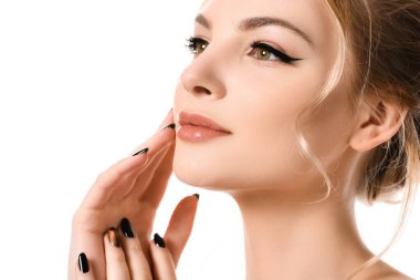 beautiful blonde woman with makeup and black nails touching face isolated on white clipart