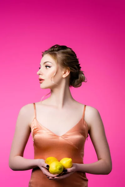 Elegant Beautiful Blonde Woman Holding Ripe Lemons Looking Away Isolated — Stock Photo, Image