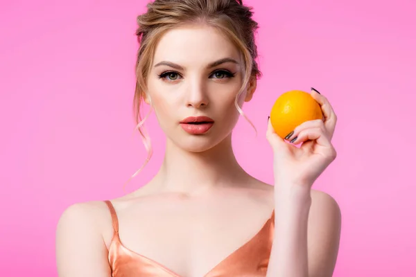 Elegant Beautiful Blonde Woman Holding Ripe Orange Isolated Pink — Stock Photo, Image