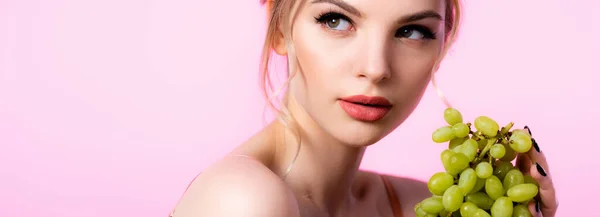 Elegant Beautiful Blonde Woman Holding Green Grapes Looking Away Isolated — Stock Photo, Image