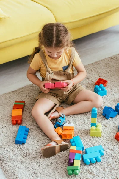 High Angle View Kid Sitting Floor Playing Multicolored Building Blocks — Stock Photo, Image