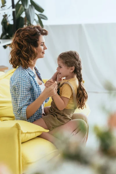 Selective Focus Adorable Kid Sitting Laps Smiling Nanny — Stock Photo, Image