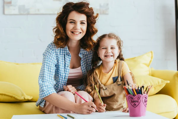 Happy Nanny Kid Smiling Camera While Drawing Together — Stock Photo, Image