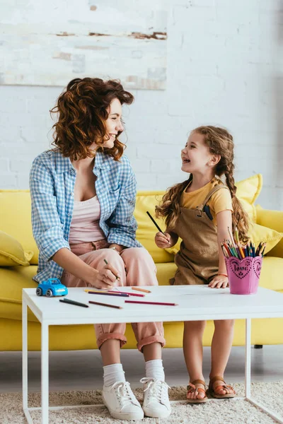 Smiling Nanny Happy Child Looking Each Other While Drawing Together — Stock Photo, Image