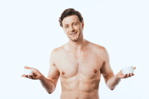 Hombre Muscular Sosteniendo Frascos Cremas Cosméticas Aisladas Blanco — Foto de Stock