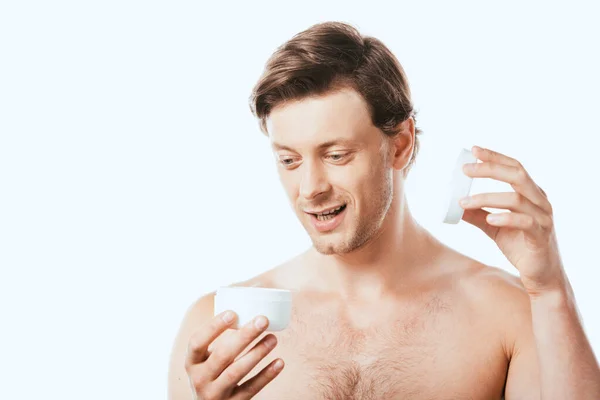 Jonge Shirtloze Man Opent Pot Cosmetische Crème Geïsoleerd Wit — Stockfoto