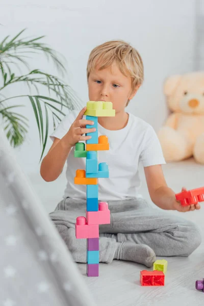 Selective Focus Boy Pajamas Sitting Floor Playing Multicolored Building Blocks — Stock Photo, Image