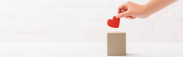 Cropped View Female Hand Putting Red Heart Box White Background — Stock Photo, Image