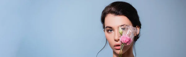 Panoramic Shot Woman Covering Eye Flowers Polyethylene Isolated Blue Ecology — Stock Photo, Image