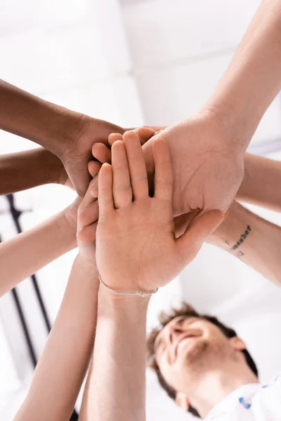 Bottom View Multiethnic Volunteers Holding Hands Charity Center — Stock Photo, Image