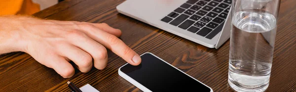 Cropped View Teleworker Touching Smartphone Blank Screen Laptop Glass Water — Stock Photo, Image