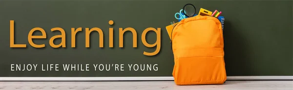 Horizontal Image Yellow Backpack Full School Stationery Green Chalkboard Learning — Stock Photo, Image