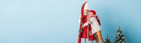 Panoramic Concept Boy Winter Outfit Hugging Sister Ski Poles Skis — Stock Photo, Image