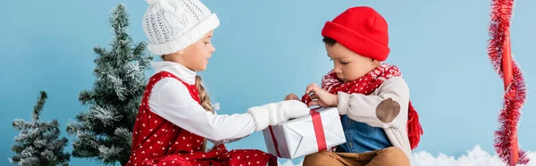 Panoramic Image Boy Girl Winter Outfit Sitting Touching Present Isolated — Stock Photo, Image