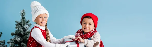 Panoramic Crop Kids Winter Outfit Touching Present Isolated Blue — Stock Photo, Image