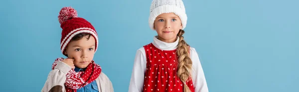 Panoramic Concept Boy Knitted Hat Scarf Touching Cheek Sister Isolated — Stock Photo, Image