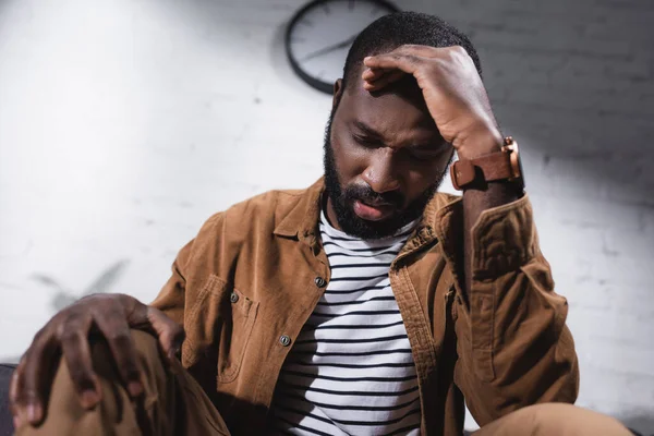 Selective Focus African American Man Sitting Touching Face — Stock Photo, Image