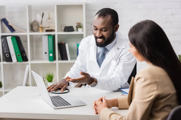 Selective Focus Bearded African American Doctor Pointing Hand Laptop Brunette — Stock Photo, Image