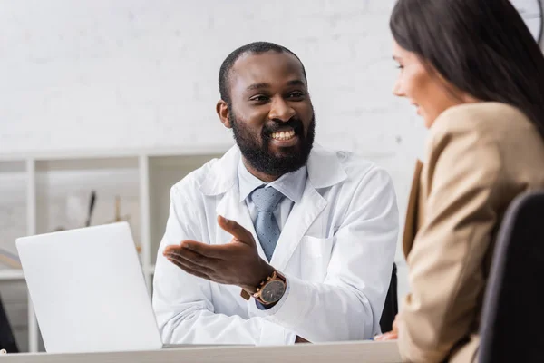 Selective Focus Brunette Woman African American Doctor Pointing Hand Laptop — Stock Photo, Image