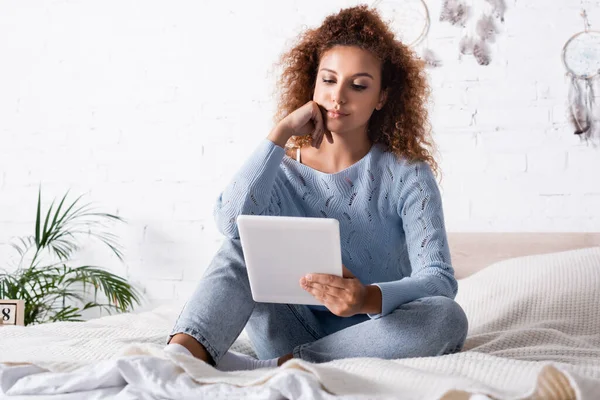 Selective Focus Young Woman Using Digital Tablet While Sitting Bed — Stock Photo, Image