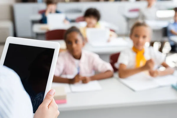 Cropped View Teacher Holding Digital Tablet Blank Screen Multiethnic Pupils — Stock Photo, Image