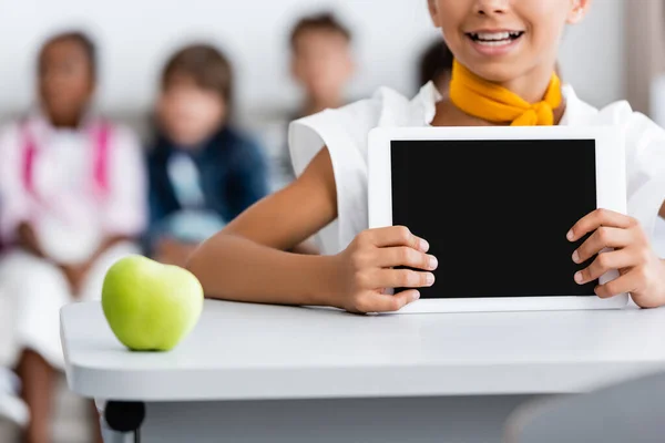 Cropped View Schoolgirl Holding Digital Tablet Blank Screen Apple Desk — Stock Photo, Image