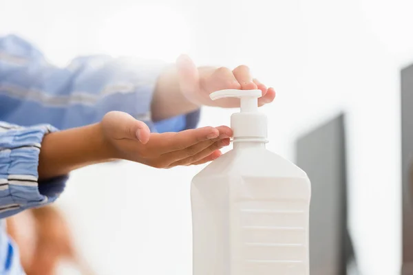 Cropped View Schoolgirl Using Hand Sanitizer Classroom — Stock Photo, Image