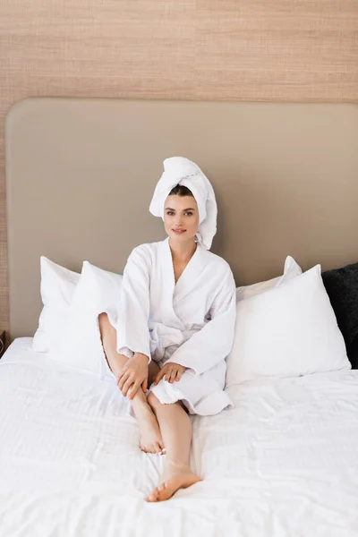 Barefoot Woman Towel White Bathrobe Lying Bed Hotel Room — Stock Photo, Image