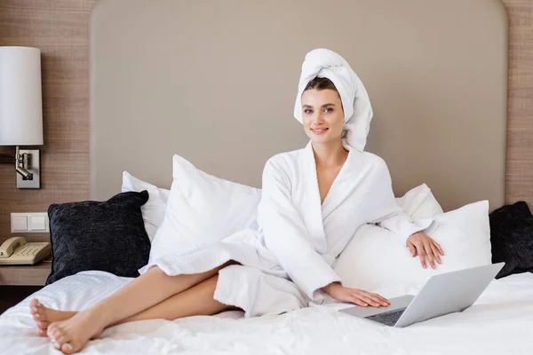 Young Freelancer Bathrobe Towel Lying Laptop Bed — Stock Photo, Image