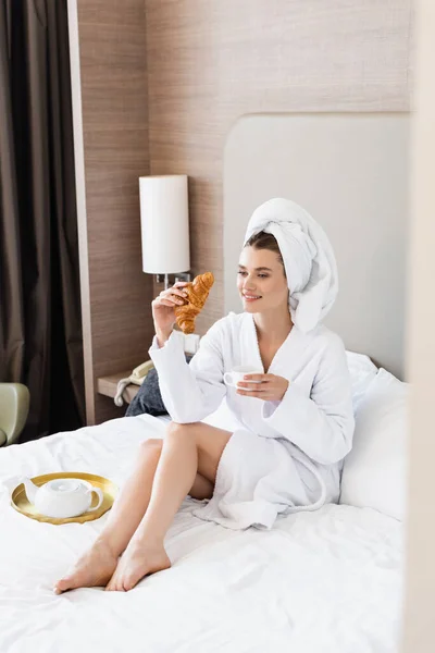 Barefoot Woman Towel Bathrobe Holding Croissant Cup Coffee Breakfast Tray — Stock Photo, Image