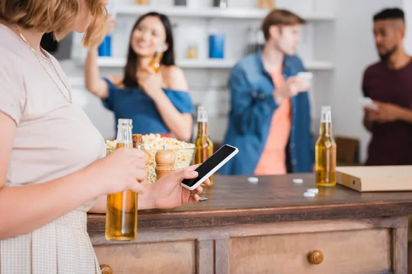 Selective Focus Young Woman Holding Beer Using Smartphone Multicultural Friends — Stock Photo, Image