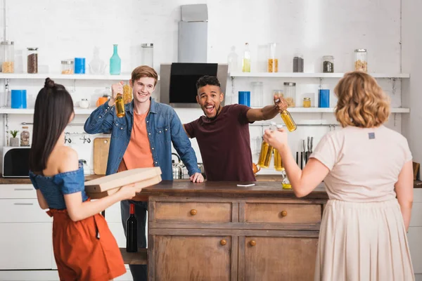 Back View Women Holding Beer Pizza Boxes Excited Multicultural Men — Stock Photo, Image