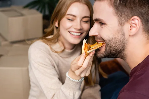 Selective Focus Woman Feeding Bearded Man Pizza — Stock Photo, Image