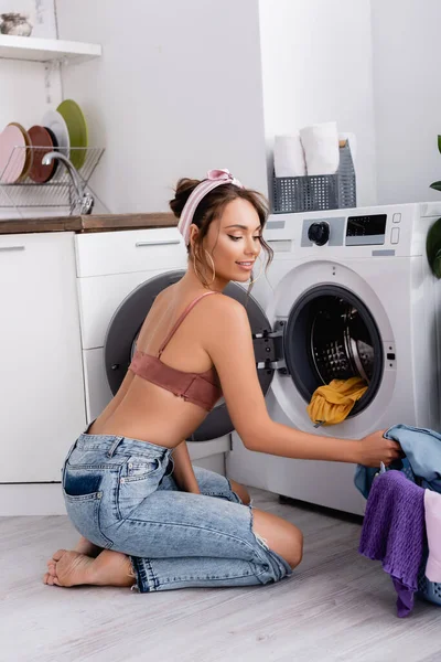 Barefoot Housewife Sitting Floor Clothes Washing Machine Kitchen — Stock Photo, Image