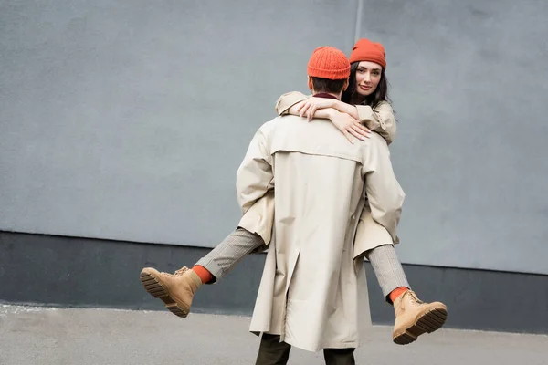 Back View Man Holding Arms Woman Beanie Hat Trench Coat — Stock Photo, Image