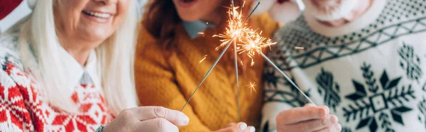 Cropped View Woman Senior Parents Holding Sparklers Panoramic Shot — Stock Photo, Image