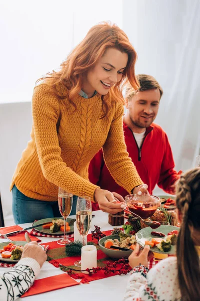 Selective Focus Happy Mother Serving Sauce Plate Festive Table — Stock Photo, Image