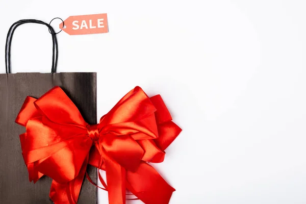 Top View Red Bow Black Shopping Bag Price Tag Sale — Stock Photo, Image