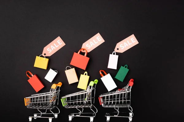 Top View Toy Carts Shopping Bags Price Tags Sale Lettering — Stock Photo, Image