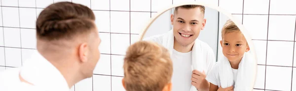 Happy Father Son Towels Looking Mirror Bathroom Blurred Foreground Banner — Stock Photo, Image