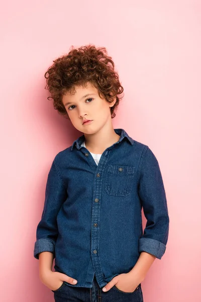 Serious Curly Boy Looking Camera Pink — Stock Photo, Image