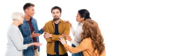 Smiling multiethnic people standing near sad friend isolated on white, banner 