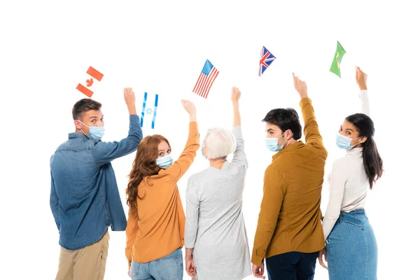 Multiethnic People Medical Masks Holding Flags Countries Isolated White — Stock Photo, Image