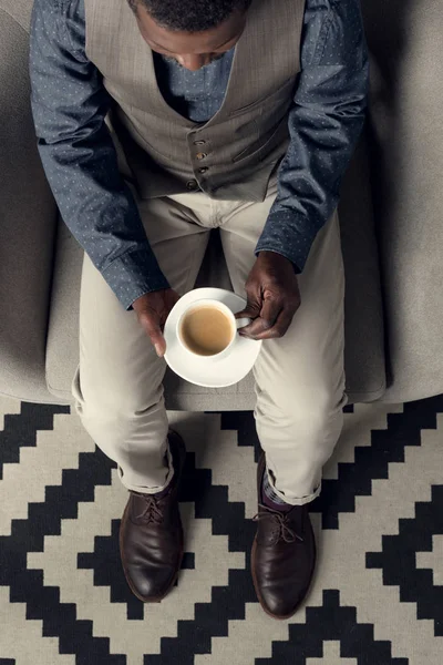 High angle view of stylish african american man with coffee cup — Stock Photo